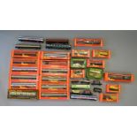 OO Gauge. 35 x assorted rolling stock, mainly Hornby. Some boxed.