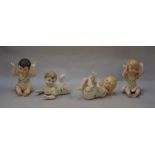 4 Continental Piano Babies, sitting up and lying down examples.