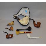 8 pipes including 3 Meerschaum examples, one with original case.