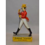 Breweryana: A reproduction resin Johnnie Walker Scotch Whiskey advertising figure