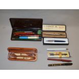 Quantity of assorted pens including Parker and a gold mounted example