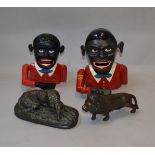 A bronze lion figure together with a resin dog example and 2 cast money banks.