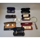 8 vintage pairs of spectacles with cases,