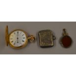 A hallmarked silver vesta case together with a gold plated pocket watch and fob (3)