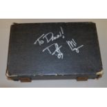 A cased clarinet signed by Guns N Roses and Velvet Revolver bassist Duff McKagen,