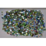 A quantity of assorted marbles including some Victorian examples.