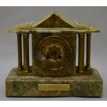 A late 19th century/early 20th century French movement marble cased mantle clock with chimer.