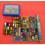 Matchbox carry case containig models, together with a boxed Seaport Playmat.