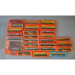 OO Gauge. 28 x boxed rolling stock, mainly coaches. Overall G in F boxes some missing inserts.