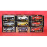Nine Bburago 1:18 scale diecast model cars. Boxed and overall appear E.