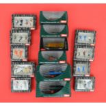 Nine Schuco 1:43 scale figure sets.