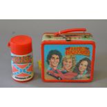 Aladdin Industries The Dukes of Hazzard tin lunchbox, brightly coloured and illustrated,