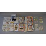 Collection of Money of The World magazines together with various vintage and foreign coins and