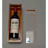 Wine: 1982 Chateau Grand-Puy-Lacoste Saint Guirons Pauillac, still sealed. In wooden display case.
