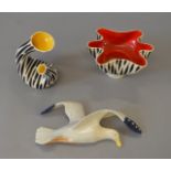 A Beswick Zebra vase with yellow interior glaze and similar vase with red interior glaze (some