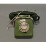 A mid 20th century rotary dial telephone.