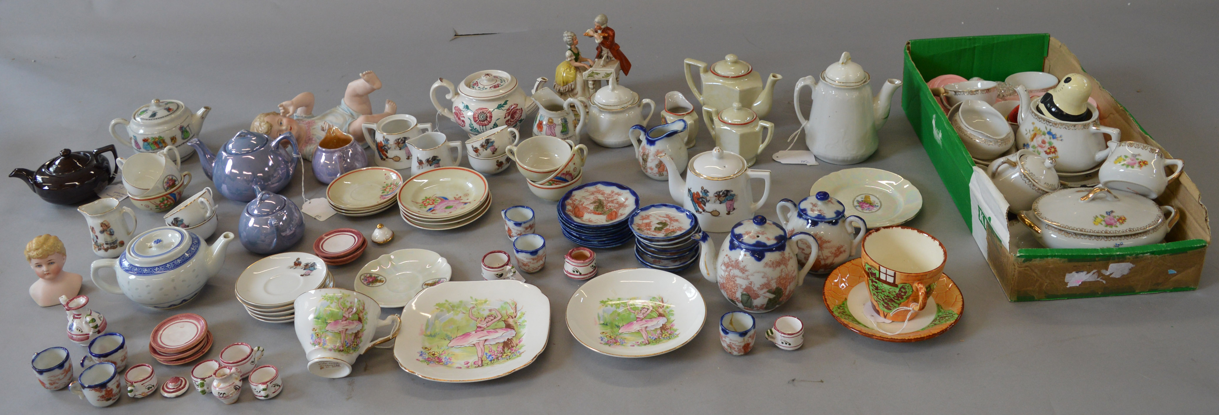 A good mixed lot of doll's ceramics and plastic examples including Art Deco and continental