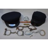 Collection of Police collectables including Hyatt handcuffs, WPC hat etc.