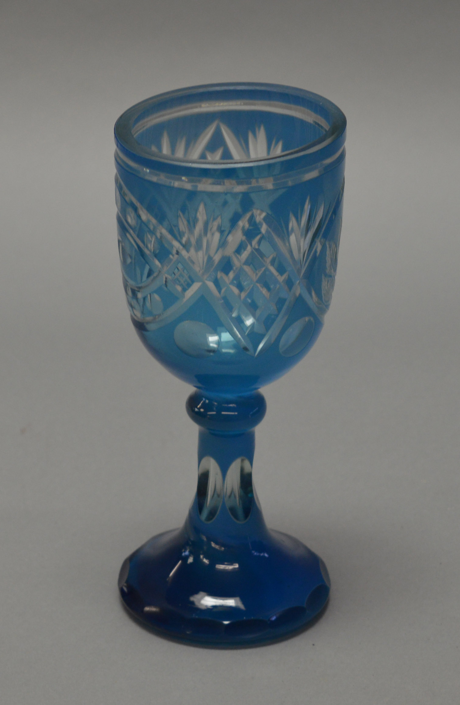 A 19th century Bohemian intaglio glass pedestal goblet. Height 20cm.