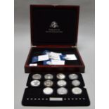 London Mint "The Fabulous 12 Silver Collection", cased with certificates (missing one coin).