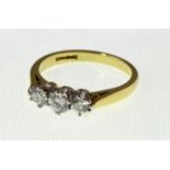 An 18ct Diamond three stone ring totalling approx 0.55ct, modern 18ct H/M, approx 3.