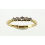 An early 20th century five-stone diamond ring, approx 0.15ct & 2.