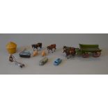 Assorted Britains items, including hay cart. Together with 2 Lesney diecast vehicles.