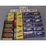27 assorted Atlas Edition diecast vehicles including Police Cars and Fire Engines, all boxed.
