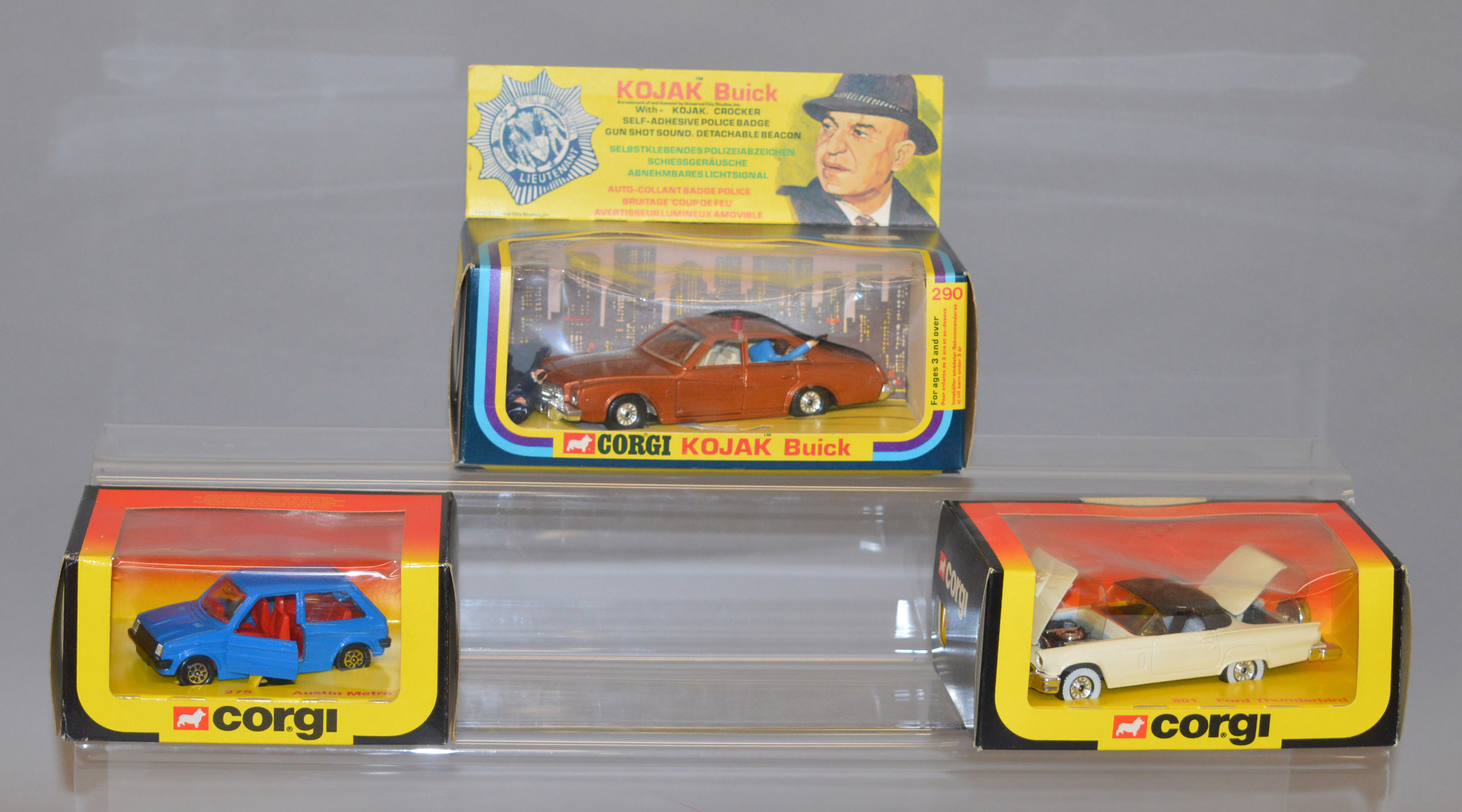 Three boxed Corgi Toys including 290 Kojak Buick complete with figure but no badge,