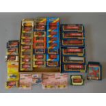 A good quantity of boxed/carded Matchbox Postal themed diecasts including both Convoy and 1-75