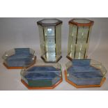 2 Crystal Arts hexagonal display cabinets together with 3 similar wall hanging examples (5)