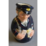 A scarce Royal Doulton character jug: D6813 Pat Parcel The Doultonville Collection