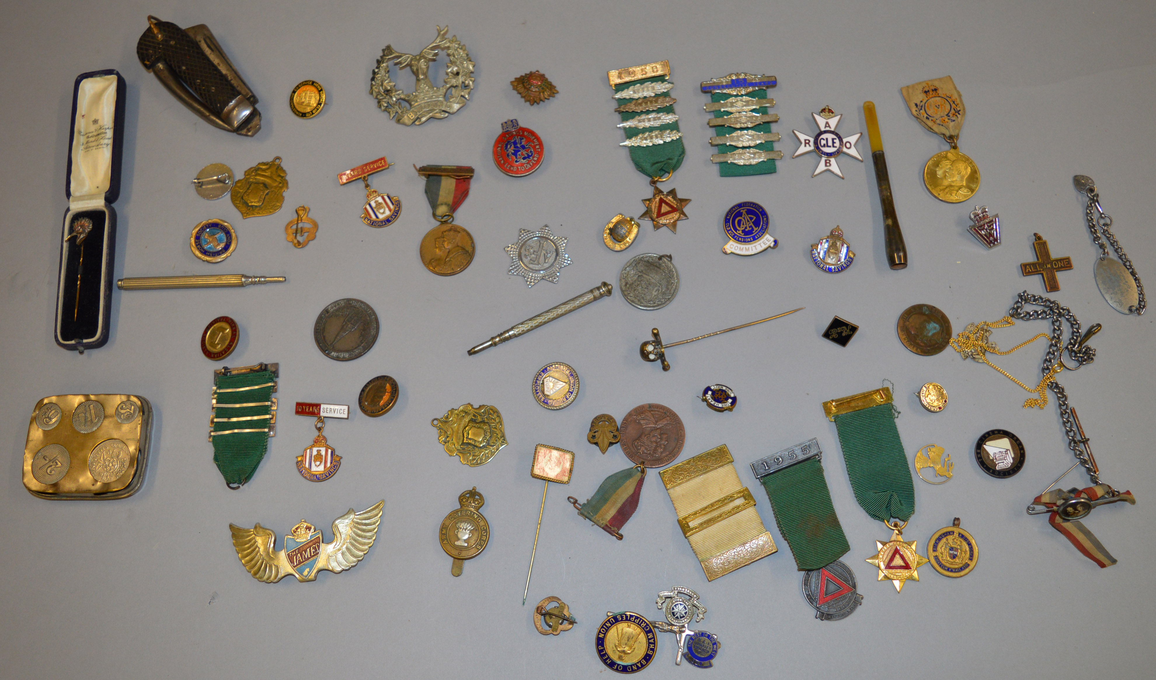 Mixed lot containing various enamel medals and badges, pins, cheroot holders, collectables etc.