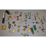 Mixed lot containing various enamel medals and badges, pins, cheroot holders, collectables etc.
