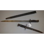 A 1907 bayonet marked WSC 1907, with sheath together with a smaller example.