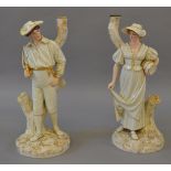 A pair of Victorian Royal Worcester James Hadley figures.
