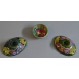 2 Moorcroft candlestick holders together with a pin dish, all with "By Appointment W.