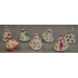 A set of 7 limited edition Royal Worcester ladies figures,
