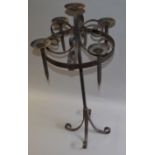 A gothic style wrought iron candelabra. 105cm tall.