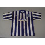 A 1997 West Bromwich Albion signed shirt worn by Shaun Murphy.