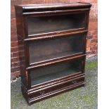 A Globe-Wernicke oak 3-tier stacking bookcase.