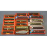 OO Gauge. 18 boxed Coaches by Hornby, Lima and Mainline, in various liveries. Overall VG.