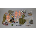 Three unboxed Action Man figures, with some damage,