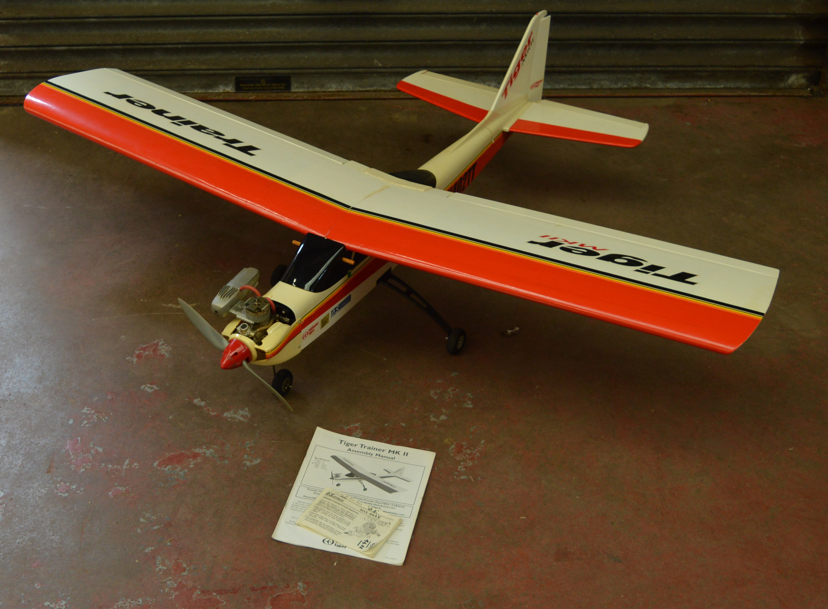 Tiger trainer radio controlled aircraft. Well built, fitted with OS max-46AX engine, servos etc.