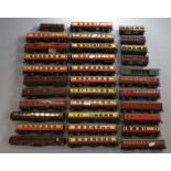 A good quantity of mostly OO Gauge Railway Carriages and other items of Rolling Stock including