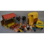 A quantity of Pedigree, Sindy and other fashion dolls including stable, buggy, three horses,