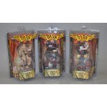 Three Dark Carnival figures (2003), including 'Cadaver the Clown' and 'The Browning Brothers'.