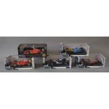 Five boxed Hot Wheels Racing 1:18 scale Formula 1 Racing Cars including a Limited Edition 2002