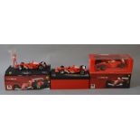 Two boxed Hot Wheels Racing 1:18 scale MIchael Schumacher Ferrari Formula 1 Racing Cars '10.9.