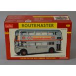 A boxed Sunstar Routemaster Bus 2906 'SRM25 (850 DYE) Queen's Silver Jubilee-Woolworth' in silver,
